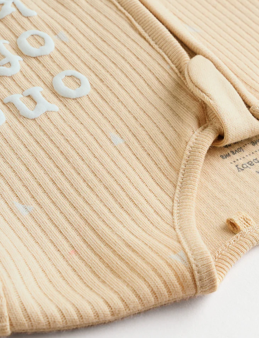 Next "One of a Kind" Sleepsuit