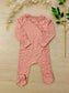 George Flowers on Pink Sleepsuit