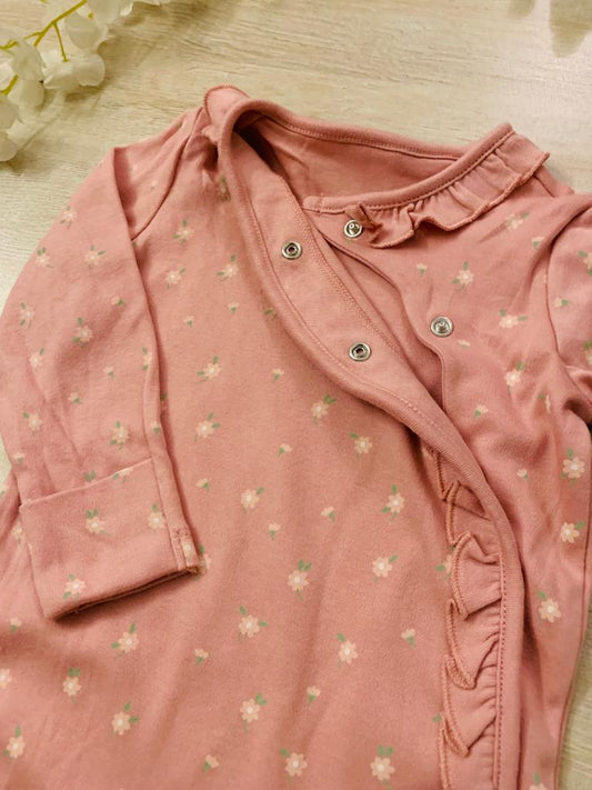 George Flowers on Pink Sleepsuit