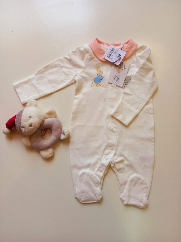 Rabbit P.R on White and pink Sleepsuit